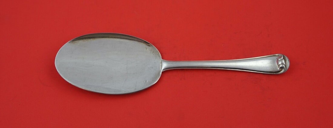 Puiforcat Mazarin Sterling Silver Ice Cream Server 9 5/8": Puiforcat Mazarin Sterling Silver Ice Cream Server 9 5/8" This exquisite ice cream server from the Mazarin pattern by Puiforcat is crafted from high-quality sterling silver. Measuring 9 5/8" in length