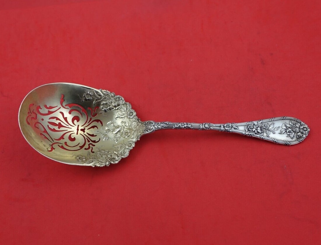 Durgin Dauphin Sterling Silver Ice Spoon 9 inches Gold Washed: Durgin Dauphin Sterling Silver Ice Spoon 9 inches Gold Washed This exquisite ice spoon features the Dauphin pattern by Durgin-Gorham, crafted from high-quality sterling silver (.925). Measuring 9 inch