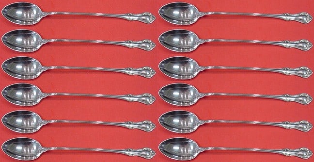 International Sterling Silver Joan of Arc Iced Tea Spoon Set 12 pcs 7 3/8": International Sterling Silver Joan of Arc Iced Tea Spoon Set 12 pcs 7 3/8" This exquisite 12-piece iced tea spoon set features the "Joan of Arc" pattern by International Sterling, measuring 7 3/8" eac