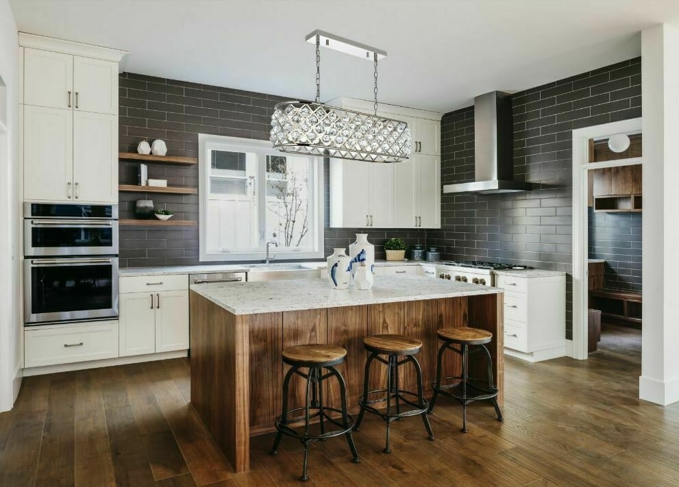 Madison 7-Light Crystal Chandelier in Polished Nickel 50 Inch Rectangular Fixture: Madison 7-Light Crystal Chandelier in Polished Nickel 50 Inch Rectangular Fixture This modern chandelier light fixture features a polished nickel finish with clear royal cut faceted crystal balls. Des