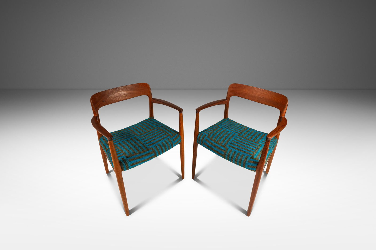Rare Set of 2 Moller Model 75 Armchairs in Teak & Mombasa Turquoise Mohair, 1960s Denmark: Rare Set of 2 Moller Model 75 Armchairs in Teak & Mombasa Turquoise Mohair, 1960s Denmark Introducing a rare and exquisite set of two Moller Model #75 Armchairs designed by Niels Moller for J.L. Molle