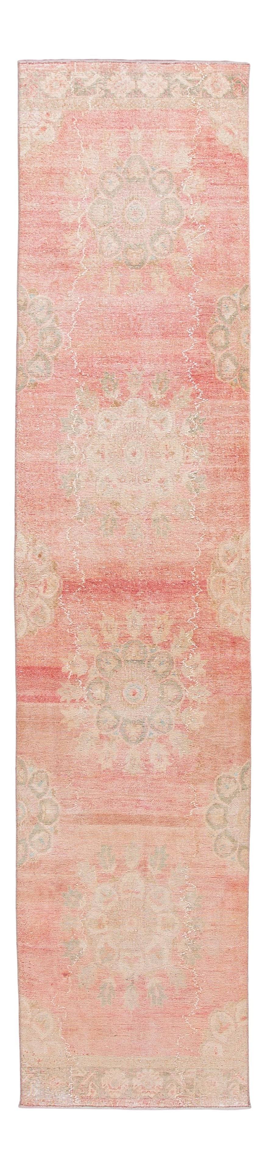 Vintage Turkish Handmade Wool Runner Pink Medallion Floral 3' x 13'9": Vintage Turkish Handmade Wool Runner Pink Medallion Floral 3' x 13'9" Enhance your space with this stunning vintage Turkish handmade wool runner. Featuring a beautiful pink-rose field, this rug is ado