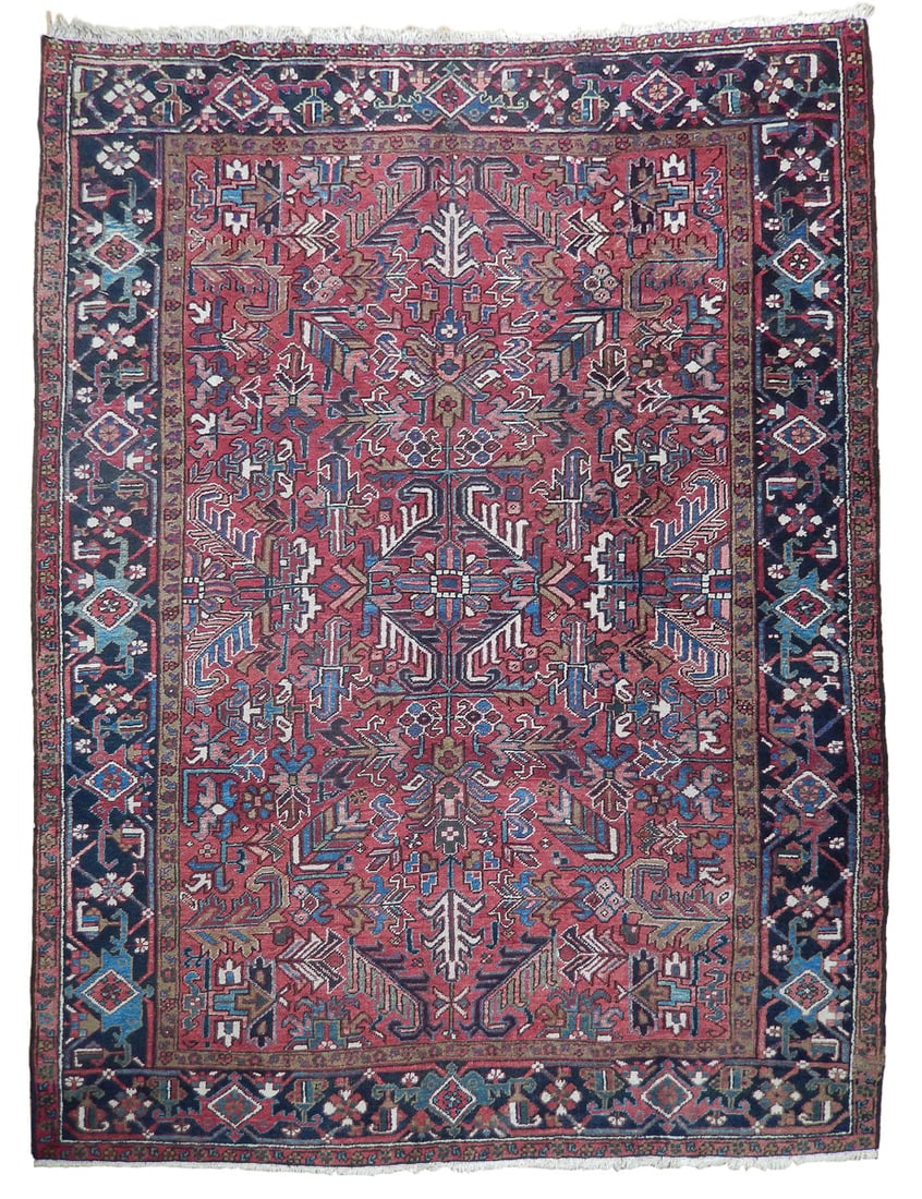 Handwoven 7.4 x 9.9 Red Persian Heriz Rug Geometric Design: Handwoven 7.4 x 9.9 Red Persian Heriz Rug Geometric Design Free continental US Shipping Enhance your living space with the exquisite 7.4 x 9.9 Red Semi-Antique Persian Heriz Rug, expertly handcrafted