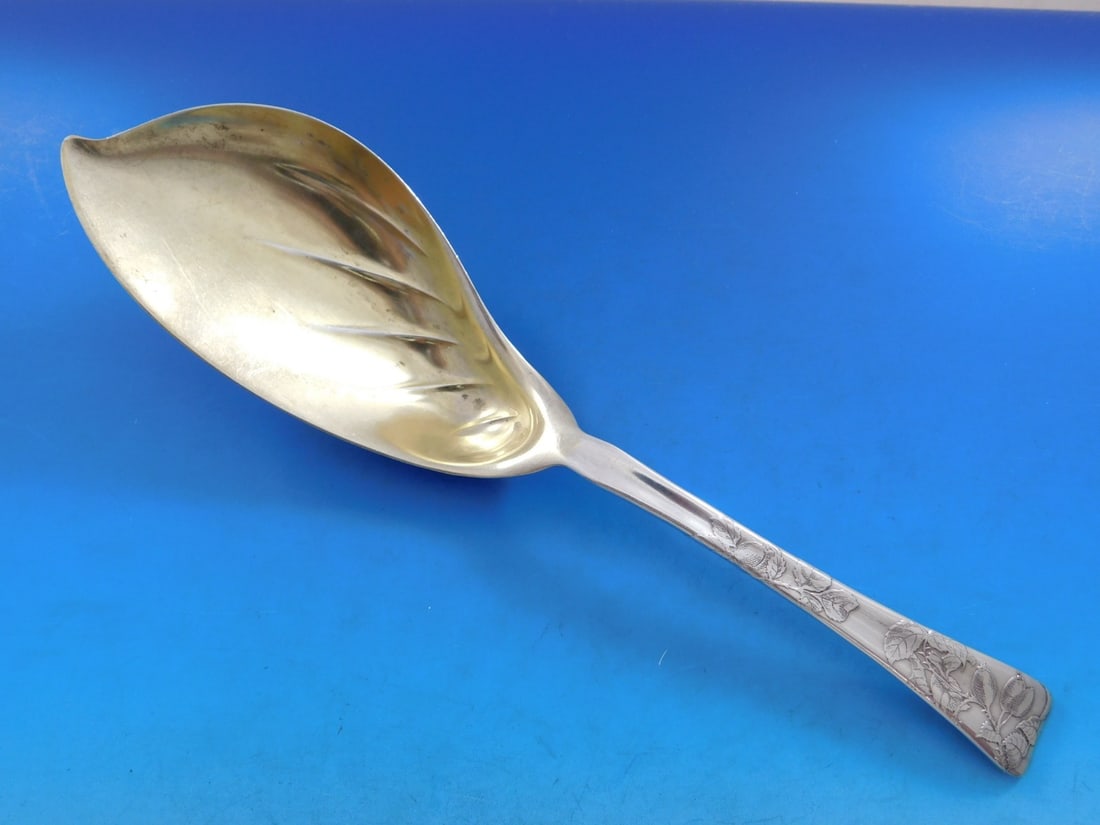 Tiffany Sterling Silver Ice Cream Server Lap Over Edge 11 3/8": Tiffany Sterling Silver Ice Cream Server Lap Over Edge 11 3/8" This exquisite ice cream server from Tiffany & Co. features the elegant Lap Over Edge pattern, characterized by intricate acid etching