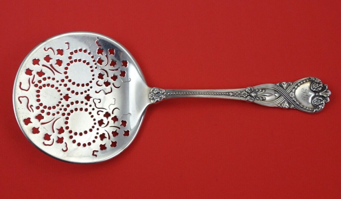 Tiffany & Co Saint James Sterling Silver Tomato Server 7.75": Tiffany & Co Saint James Sterling Silver Tomato Server 7.75" This exquisite tomato server from the Saint James pattern by Tiffany & Co. is crafted from high-quality sterling silver. Measuring 7 3/4 in