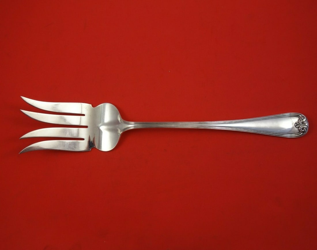 Durgin New Standish Sterling Silver Buffet Fork 11 3/4 Inch Serving: Durgin New Standish Sterling Silver Buffet Fork 11 3/4 Inch Serving Elevate your dining experience with this exquisite New Standish buffet fork by Durgin. Crafted from high-quality sterling silver,