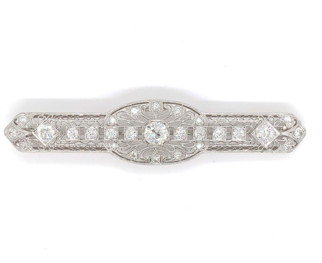 Art Deco Platinum Diamond Pin 3.02 Carat GIA Certified: Art Deco Platinum Diamond Pin 3.02 Carat GIA Certified Presenting a stunning Art Deco platinum pin adorned with genuine natural diamonds, showcasing an impressive total diamond weight of approximately