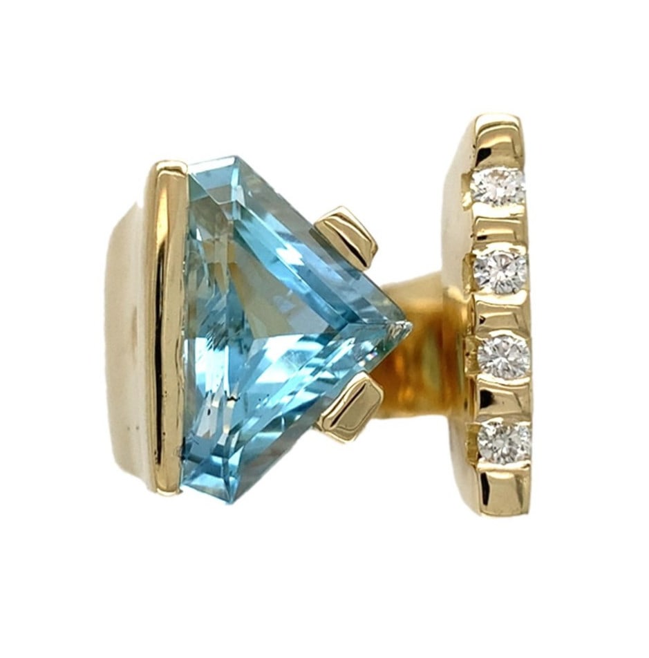 14k Yellow Gold Heavy Modern Aquamarine Diamond Ring GIA Certified: 14k Yellow Gold Heavy Modern Aquamarine Diamond Ring GIA Certified This stunning 14k yellow gold heavy modern ring features a large, genuine natural aquamarine in a specialty triangular cut, measuring