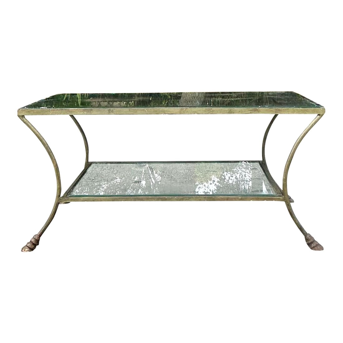 Vintage Regency Brass Hoof Coffee Table Dual-Tiered Glass Top: Vintage Regency Brass Hoof Coffee Table Dual-Tiered Glass Top The Vintage Regency Brass Hoof Coffee Table is a stunning piece that embodies timeless elegance and sophisticated design. Crafted with a s