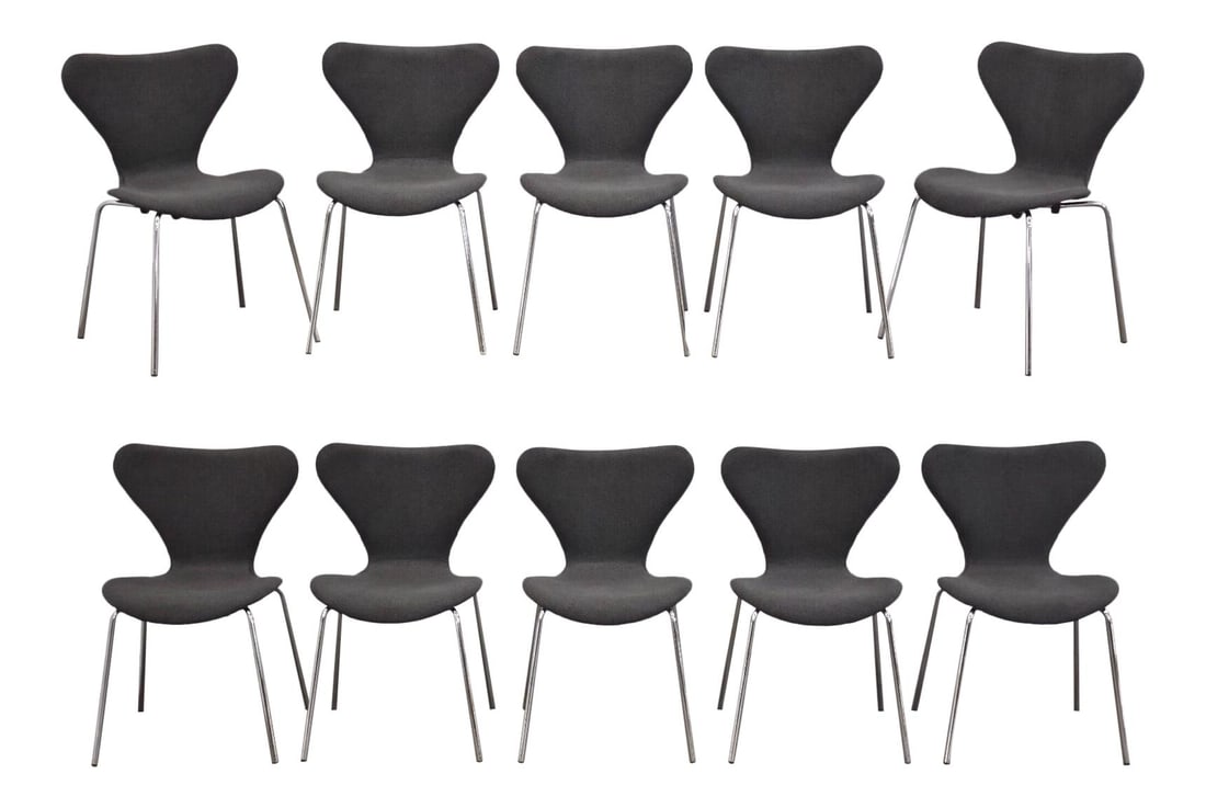 Set of 10 Arne Jacobsen Inspired Grey Dining Chairs: Set of 10 Arne Jacobsen Inspired Grey Dining Chairs This set of ten mid-century modern dining chairs is inspired by the iconic designs of Arne Jacobsen. Featuring a stylish dark grey finish and