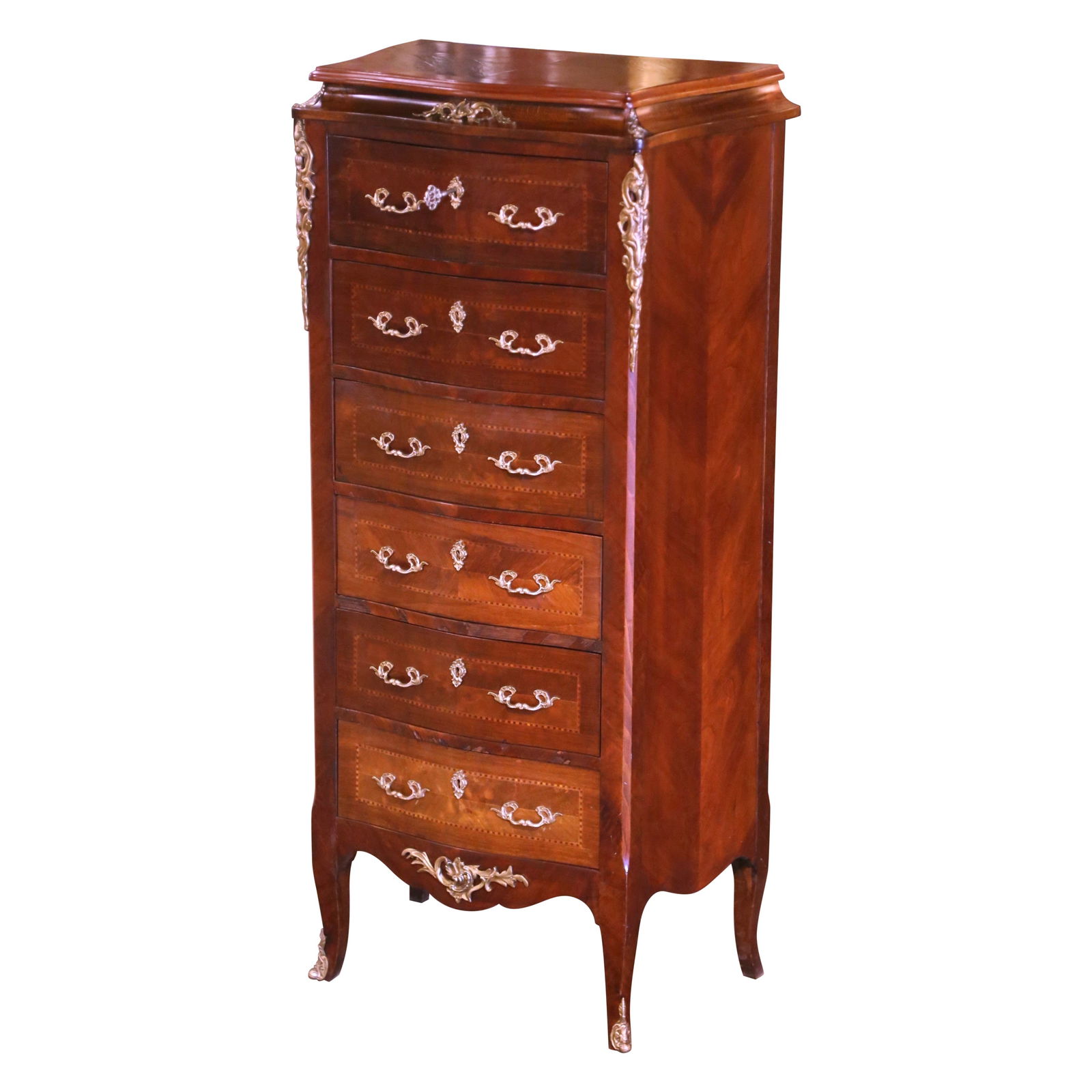 French Rosewood Bombe Semainier Chest with Six Drawers and Bronze Mounts: French Rosewood Bombe Semainier Chest with Six Drawers and Bronze Mounts This Mid-Century French Louis XV style semainier chest, crafted circa 1960, features elegant hand-carved rosewood veneer and in