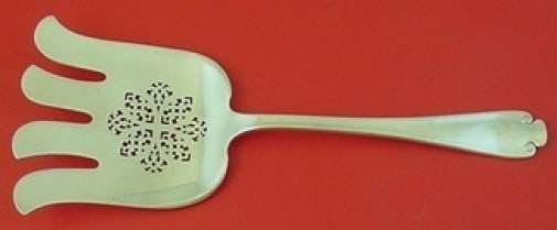 Tiffany & Co Flemish Sterling Silver Pierced Asparagus Fork 9.5 in: Tiffany & Co Flemish Sterling Silver Pierced Asparagus Fork 9.5 in This exquisite asparagus fork is a stunning example of the Flemish pattern by Tiffany & Co. Crafted from high-quality sterling