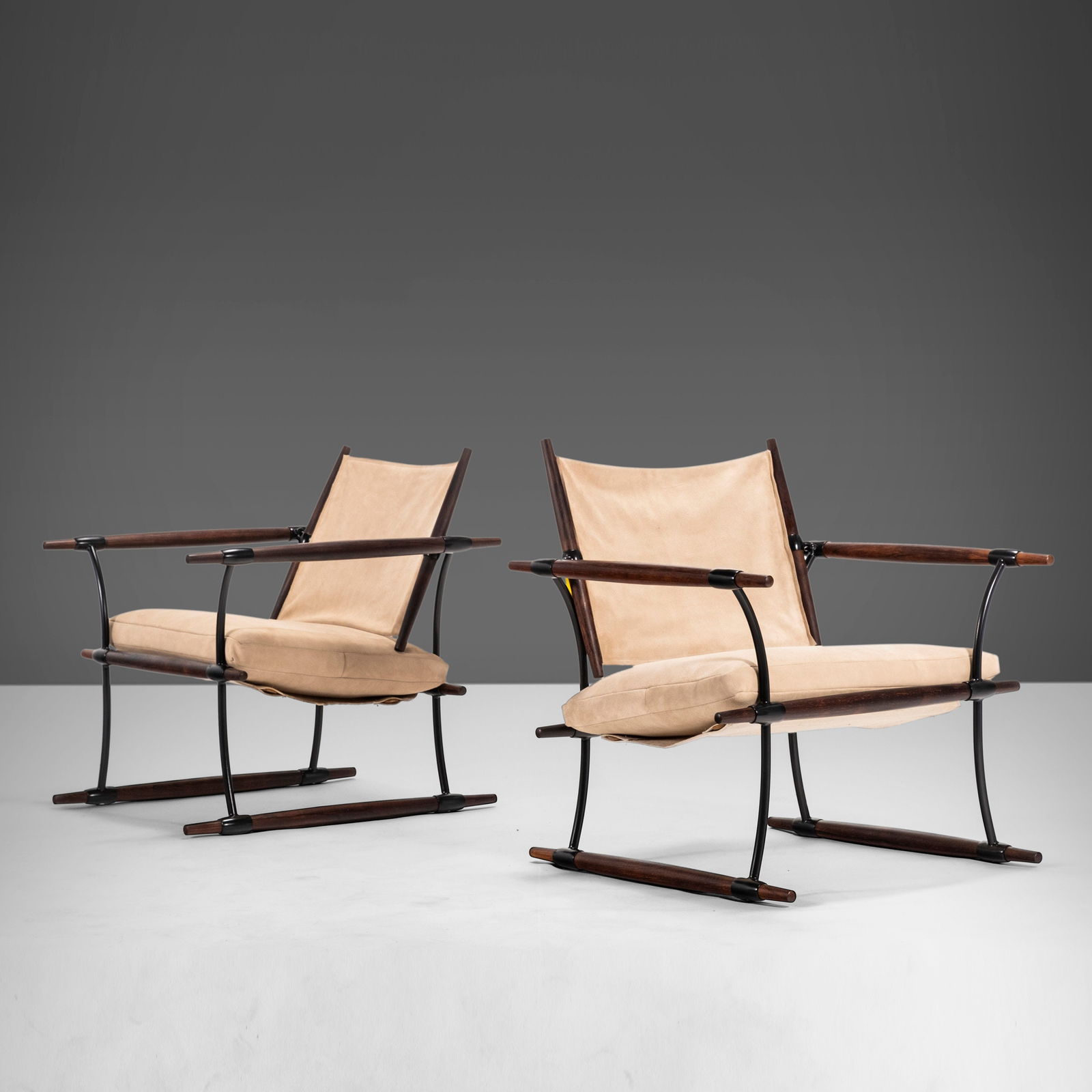 Rare Stokke Lounge Chairs by Jens Quistgaard in Suede Leather & Rosewood Frame: Rare Stokke Lounge Chairs by Jens Quistgaard in Suede Leather & Rosewood Frame Introducing a rare set of two Stokke lounge chairs designed by Jens Harald Quistgaard for Nissen Langaa, Denmark, produce