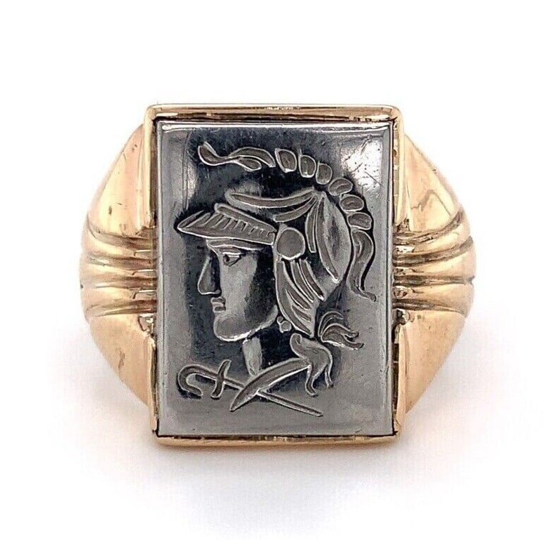 Vintage 10k Gold Silver Warrior Intaglio Men's Ring Size 8 GIA Certified: Vintage 10k Gold Silver Warrior Intaglio Men's Ring Size 8 GIA Certified This vintage 10k yellow gold and silver ring features a striking warrior intaglio design. The rectangular silver panel measures