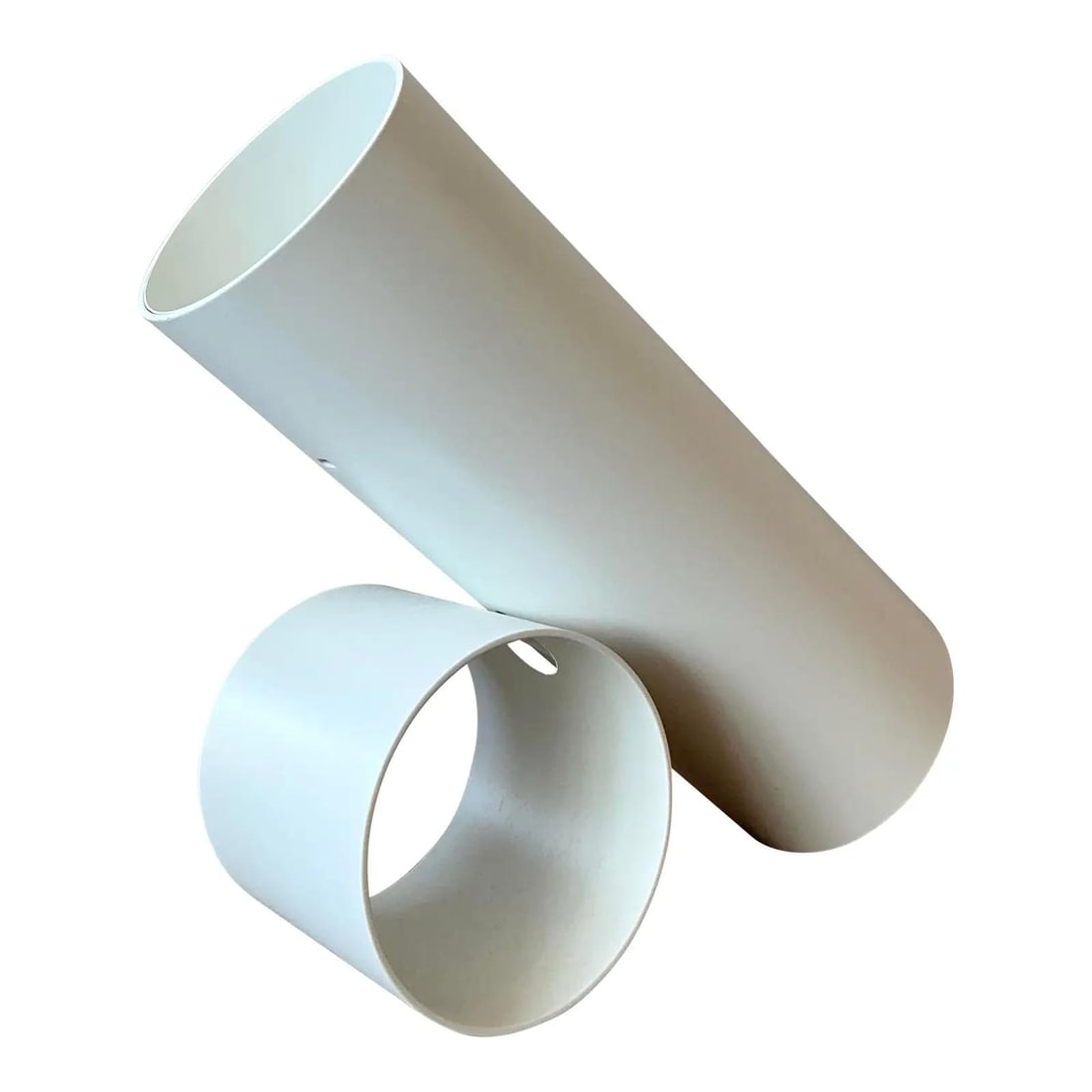 White Cylindrical Minimalist Table Lamp with 1970s Modernist Design: White Cylindrical Minimalist Table Lamp with 1970s Modernist Design This vintage Boho Flos Sawaru table lamp showcases a minimalist design inspired by Mid-Century Modern and post-modern aesthetics. Cr