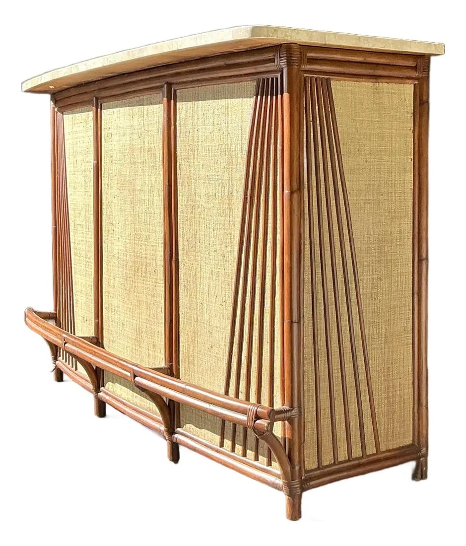 Mid Century Rattan Grasscloth Bar Cabinet With Marble Top And Flared Profile: Mid Century Rattan Grasscloth Bar Cabinet With Marble Top And Flared Profile This vintage dry bar cabinet exemplifies mid-century tropical style with a Hollywood Regency touch. Crafted with a flared s
