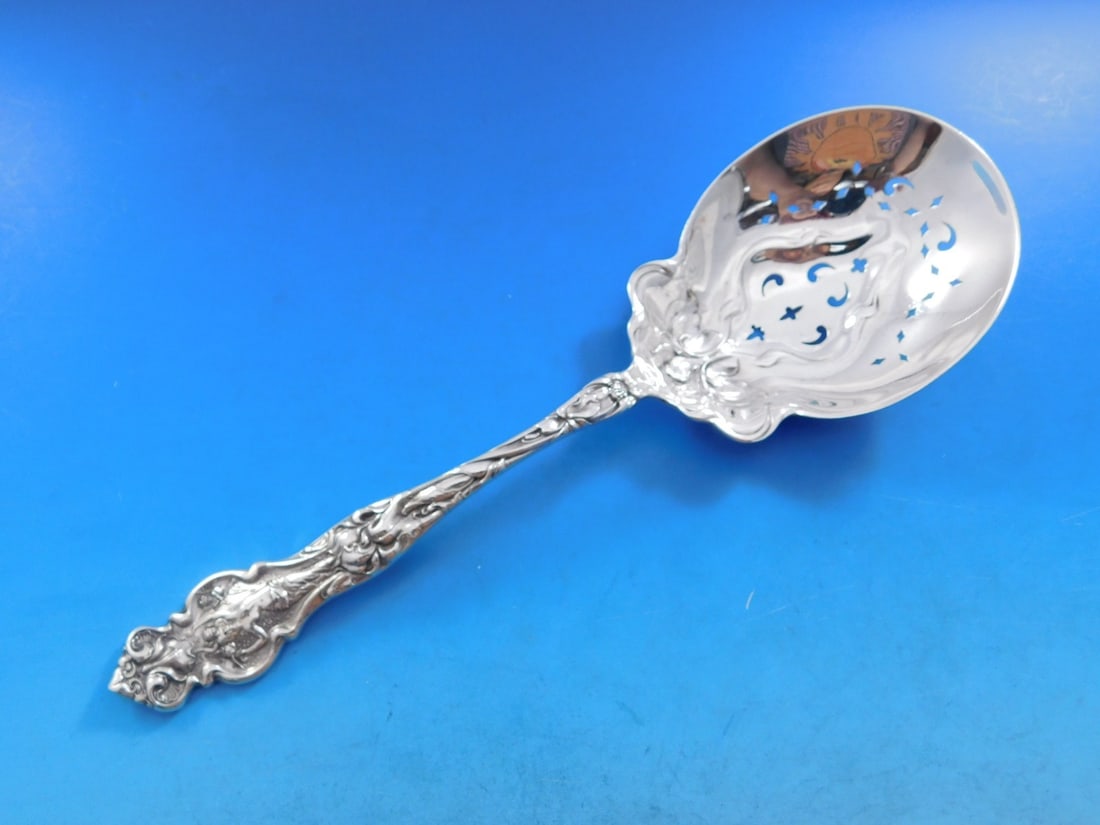 Wallace Irian Sterling Silver Art Nouveau Ice Spoon 9": Wallace Irian Sterling Silver Art Nouveau Ice Spoon 9" Enhance your dining experience with this exquisite Irian ice spoon by Wallace, crafted from high-quality sterling silver. Featuring an elegant Ar