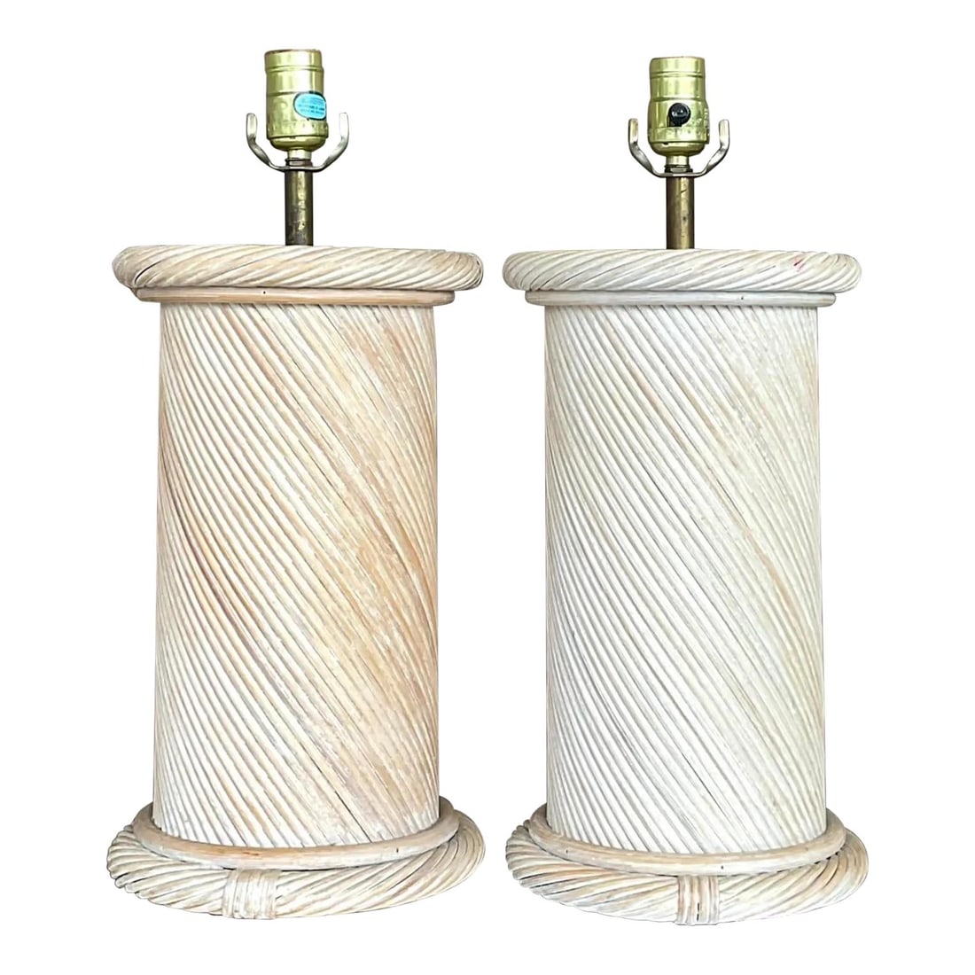 Pair of Vintage Coastal Swirl Reed Lamps Almond Finish: Pair of Vintage Coastal Swirl Reed Lamps Almond Finish This stunning pair of vintage Coastal table lamps features a chic swirl pencil reed construction, elegantly finished in a washed almond color. Pe