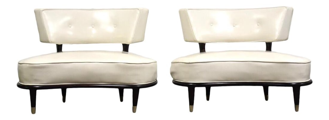 Mid-Century Modern White Mahogany Lounge Chairs Pair with Brass Ferrules: Mid-Century Modern White Mahogany Lounge Chairs Pair with Brass Ferrules This pair of mid-century modern oversized lounge chairs features a stylish combination of white and mahogany colors, accented w
