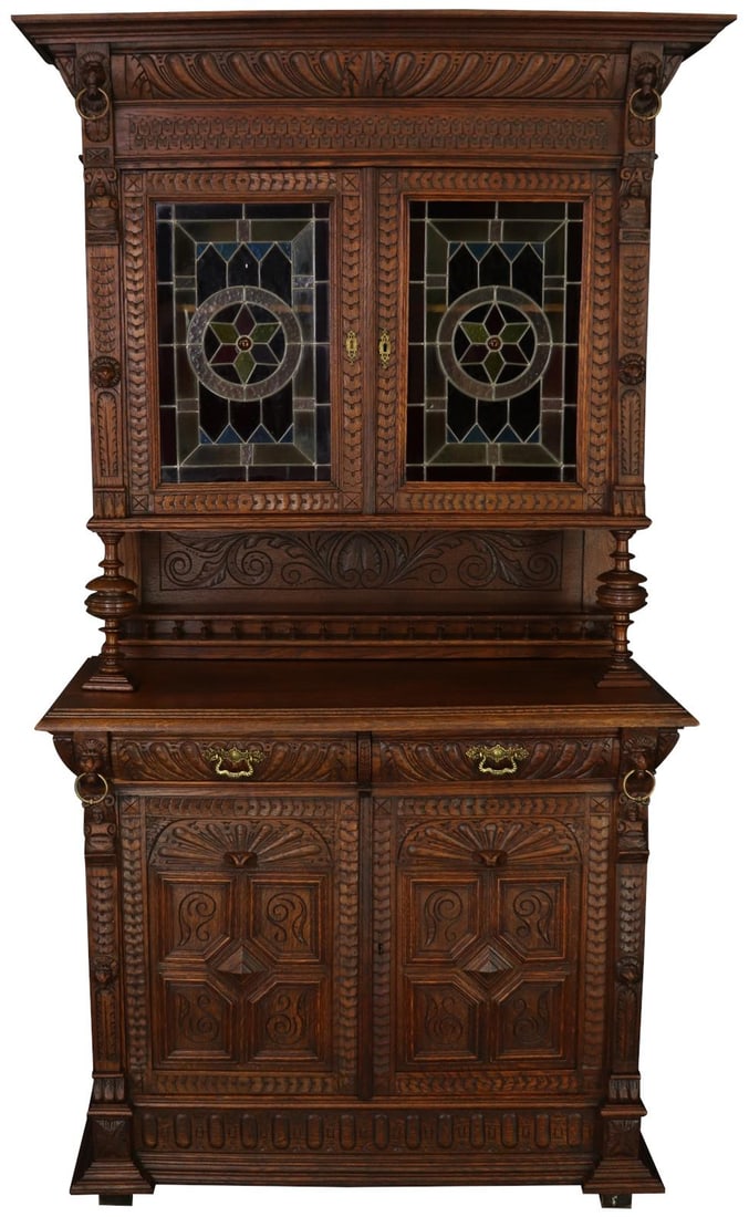 Renaissance Mechelen Antique Belgian Buffet with Lion Carvings: Renaissance Mechelen Antique Belgian Buffet with Lion Carvings This exquisite antique Belgian cabinet showcases stunning lion carvings, reflecting the craftsmanship of the Renaissance Mechelen style.