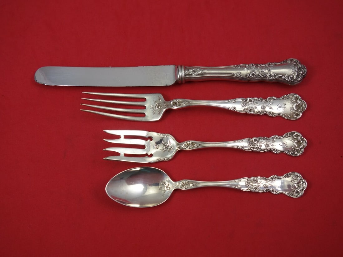 International Sterling Silver Pansy Pattern 4-Piece Place Setting: International Sterling Silver Pansy Pattern 4-Piece Place Setting This exquisite 4-piece place setting in the Pansy pattern by International Sterling Silver is a beautiful addition to any dining colle