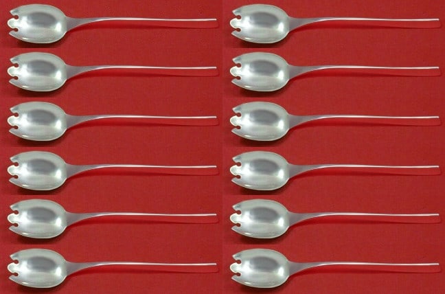 International Sterling Silver Vision Dessert Fork Set of 12: International Sterling Silver Vision Dessert Fork Set of 12 Enhance your dining experience with this exquisite set of 12 dessert forks from the Vision pattern by International. Crafted from high-quali