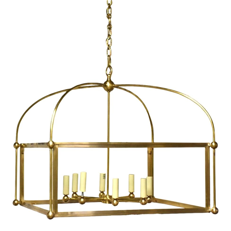Antique Brass Lantern Chandelier by Chapman and Myers 29 Inch: Antique Brass Lantern Chandelier by Chapman and Myers 29 Inch Illuminate your space with this stunning Chapman and Myers lantern chandelier, crafted from antique brass. This elegant fixture brings a t
