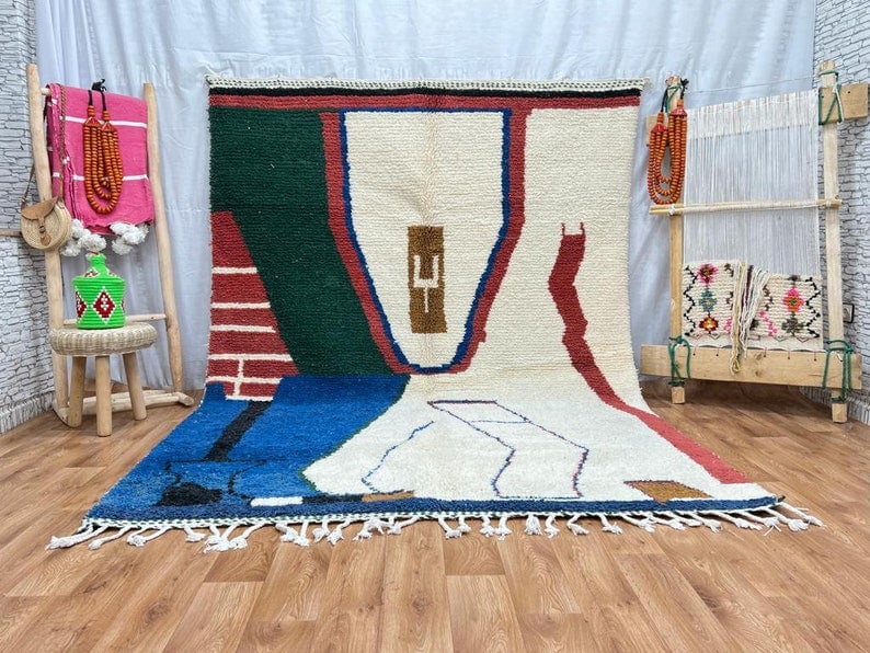 Authentic Handwoven Colorful Rug from Morocco 8 x 5 Feet: Authentic Handwoven Colorful Rug from Morocco 8 x 5 Feet This authentic colorful rug is handwoven in the Atlas Mountains by skilled local Berber women weavers. Crafted using traditional tools and natu
