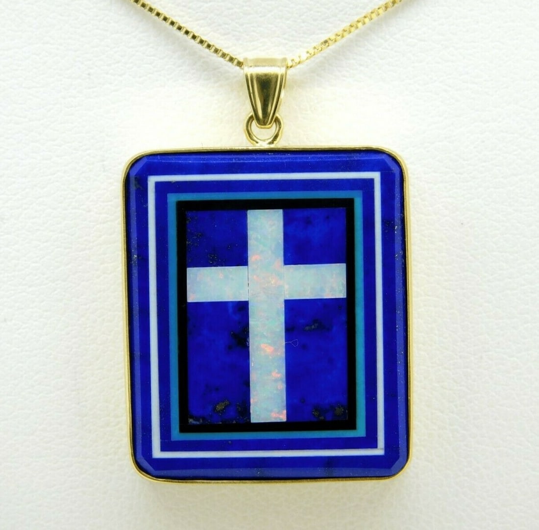 Jim Kaufmann 14K Gold Intarsia Pendant with Opal Cross and Chain: Jim Kaufmann 14K Gold Intarsia Pendant with Opal Cross and Chain This exquisite pendant by Jim Kaufmann features a stunning intarsia design, showcasing a genuine natural opal cross at its center. Craf