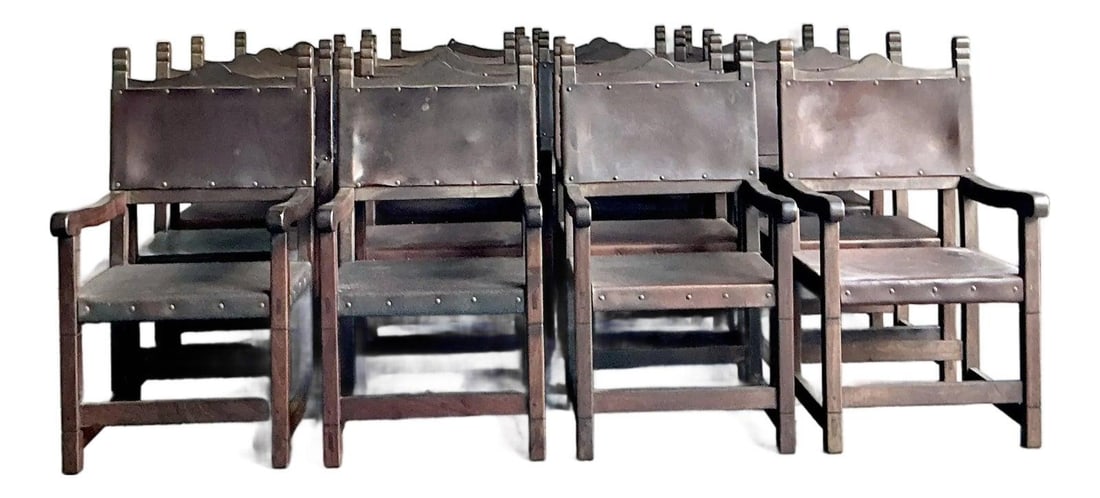 Set of 16 Spanish Revival Leather and Wood Handcrafted Dining Chairs: Set of 16 Spanish Revival Leather and Wood Handcrafted Dining Chairs This set of sixteen vintage Spanish Revival dining chairs features hand-crafted solid wood frames with elegantly carved details and