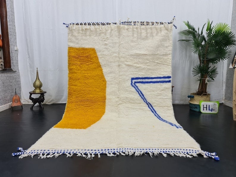 Handmade Moroccan Berber Wool Area Rug 9.84 x 6.56 Feet: Handmade Moroccan Berber Wool Area Rug 9.84 x 6.56 Feet Experience the elegance of this Stunning Soft Handmade Moroccan Berber Wool Area Rug. Handwoven in the Atlas Mountains by skilled Berber women w