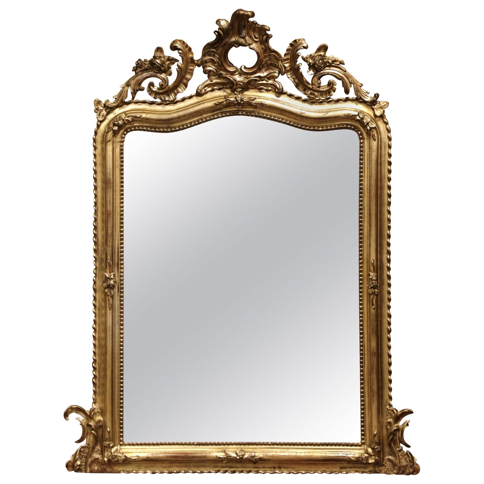 19th Century French Louis XV Giltwood Rocaille Mirror 62in Tall: 19th Century French Louis XV Giltwood Rocaille Mirror 62in Tall This exquisite 19th Century French Louis XV Carved and Arched Giltwood Rocaille Mirror is a stunning example of craftsmanship from the m