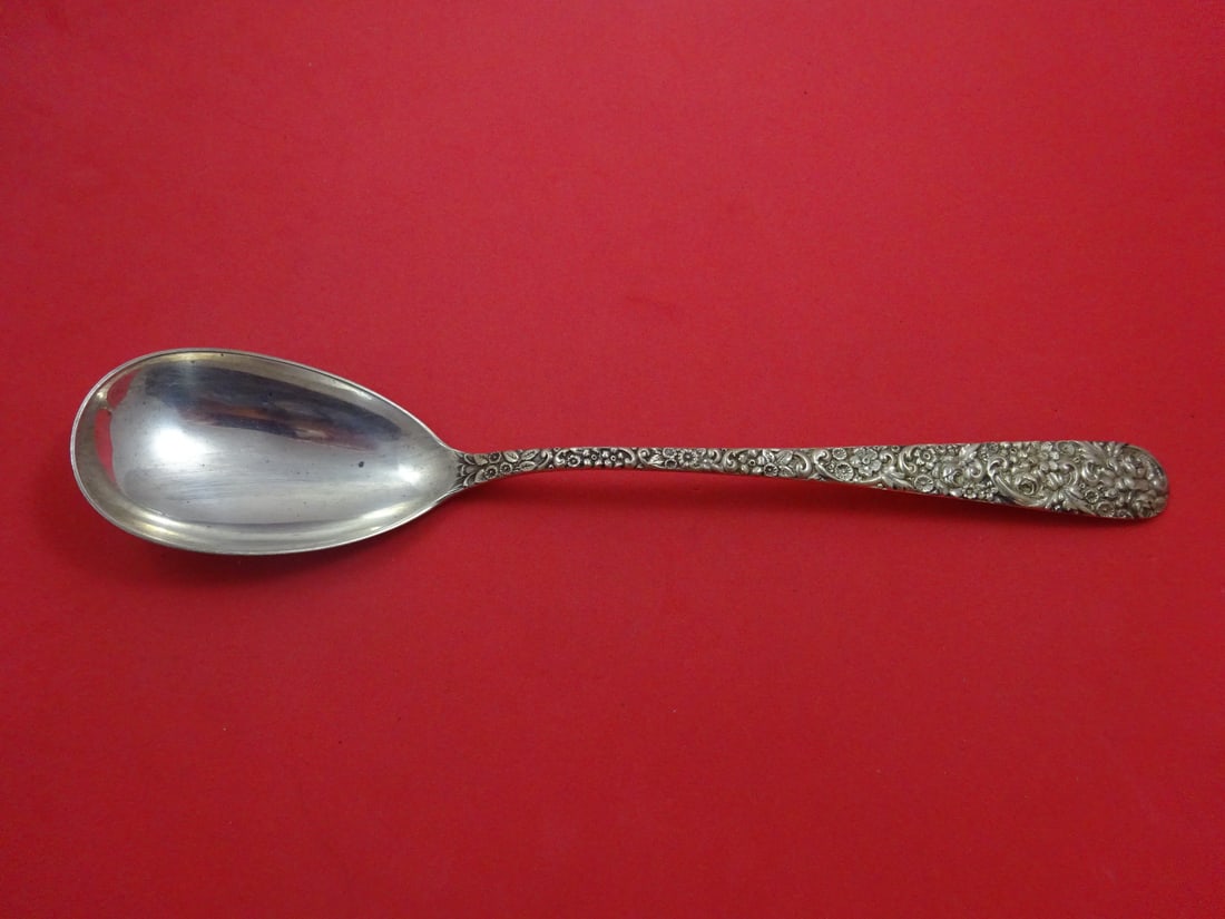 Jenkins & Jenkins Sterling Silver Repousse Serving Spoon 11 7/8": Jenkins & Jenkins Sterling Silver Repousse Serving Spoon 11 7/8" This exquisite stuffing spoon features the elegant Repousse pattern by Jenkins & Jenkins, crafted from high-quality sterling silver. Wi