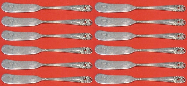 International Sterling Silver Spring Glory Butter Spreader Set 12 pcs: International Sterling Silver Spring Glory Butter Spreader Set 12 pcs Enhance your dining experience with this exquisite 12-piece set of butter spreaders from the renowned Spring Glory pattern by Inte