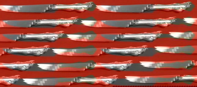 Towle Debussy Sterling Silver Steak Knife Set 12 pcs 8 1/4 in: Towle Debussy Sterling Silver Steak Knife Set 12 pcs 8 1/4 in Enhance your dining experience with this custom set of 12 Debussy steak knives by Towle. Each knife features a hollow handle crafted from