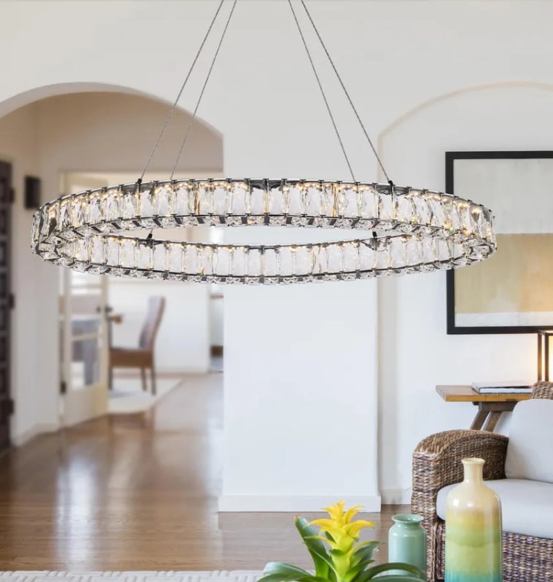 Modern Oval LED Crystal Chandelier in Black 36 x 16 Inch for Dining or Kitchen: Modern Oval LED Crystal Chandelier in Black 36 x 16 Inch for Dining or Kitchen This modern oval chandelier features a sleek black stainless steel frame adorned with royal cut clear crystals. Designed