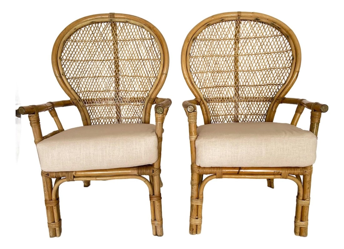 Set of 2 Bamboo Rattan Fan Back Armchairs with Pink Linen Cushions: Set of 2 Bamboo Rattan Fan Back Armchairs with Pink Linen Cushions This pair of vintage bamboo and rattan fan back arm chairs features a stylish island-inspired design with a warm honey camel color fi