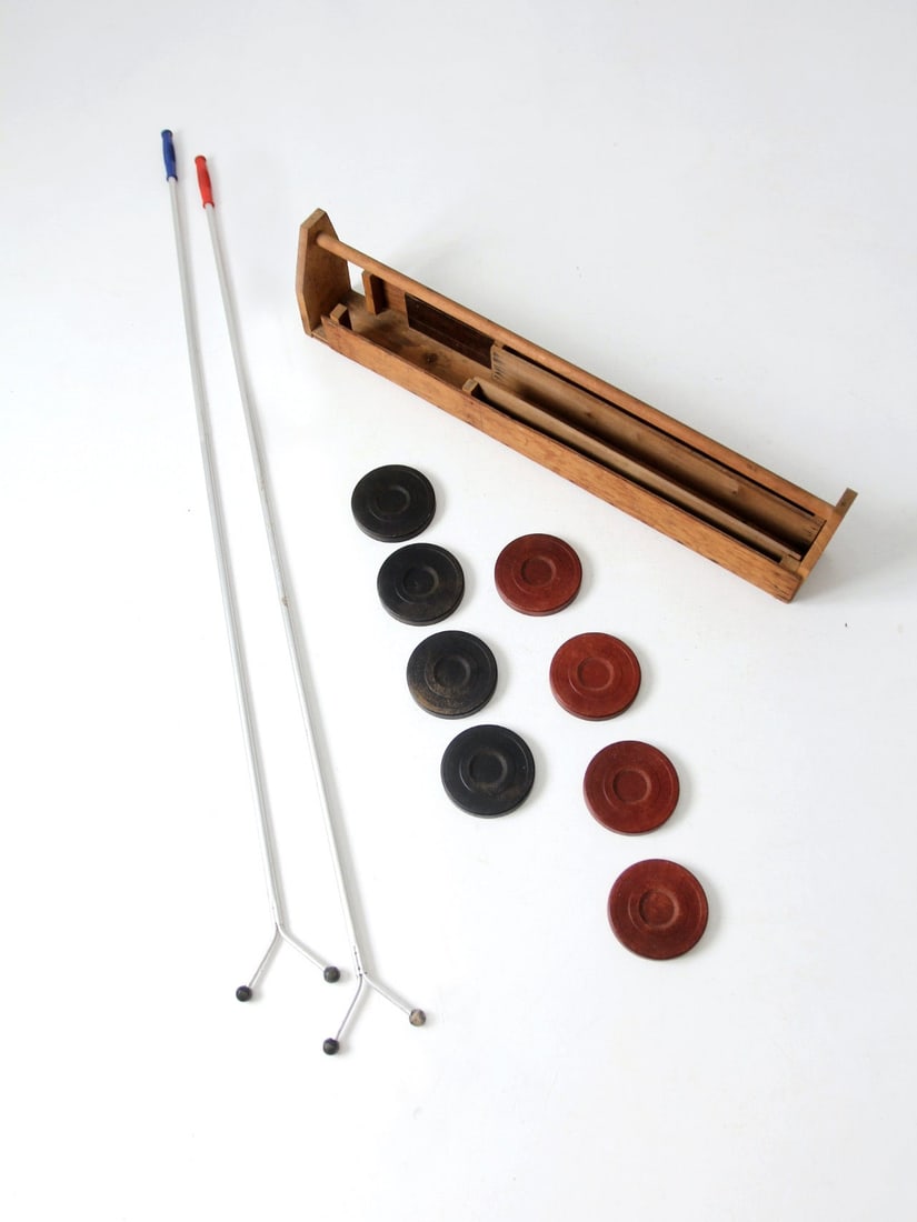 Vintage Shuffleboard Set with Wood Tote Box and 8 Discs: Vintage Shuffleboard Set with Wood Tote Box and 8 Discs Experience the timeless fun of shuffleboard with this vintage shuffleboard set, complete with a custom-made wood tote for easy transport. The se
