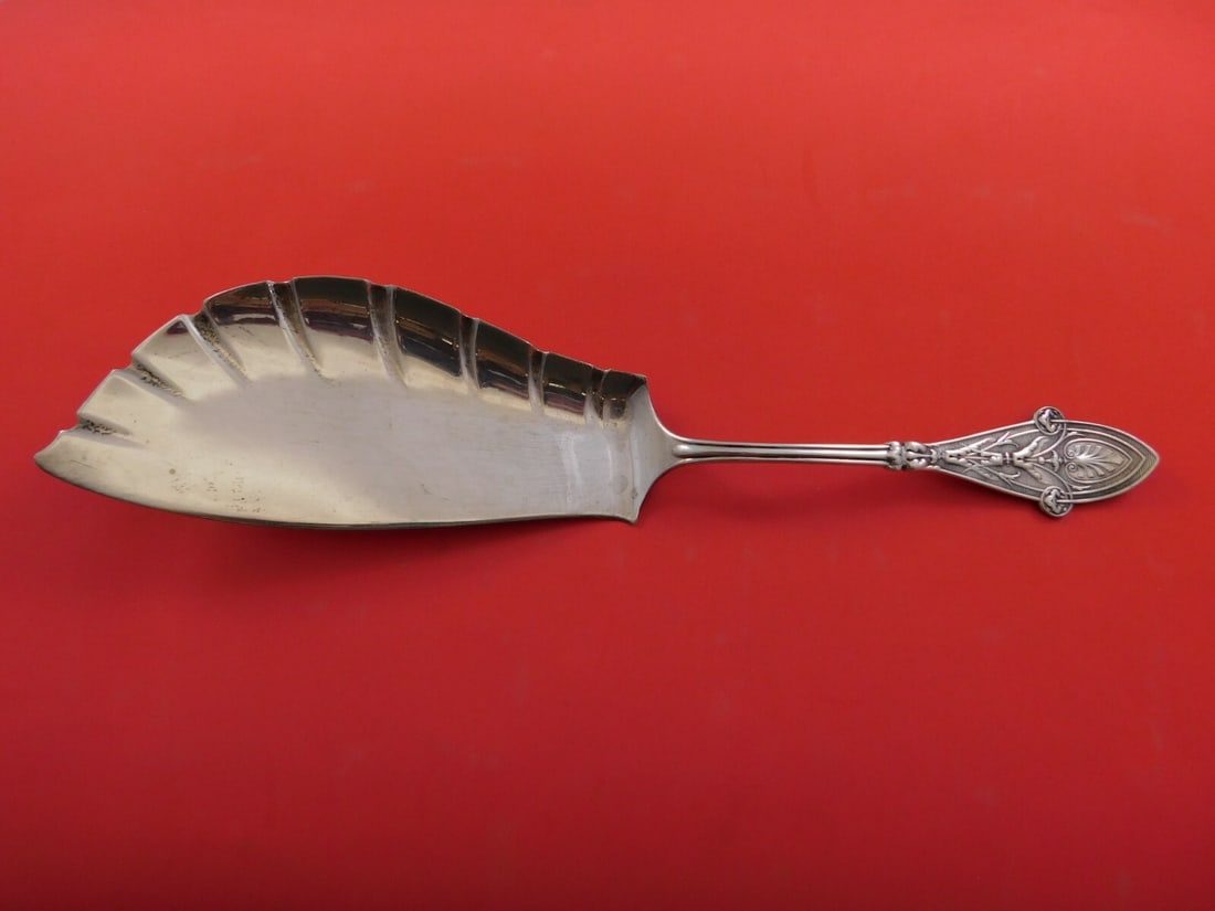 Tiffany & Co Italian Sterling Silver Fish Server 12 1/4 Fluted Edge: Tiffany & Co Italian Sterling Silver Fish Server 12 1/4 Fluted Edge This exquisite fish server from Tiffany & Co. showcases the elegant Italian pattern, crafted from high-quality sterling silver. Meas