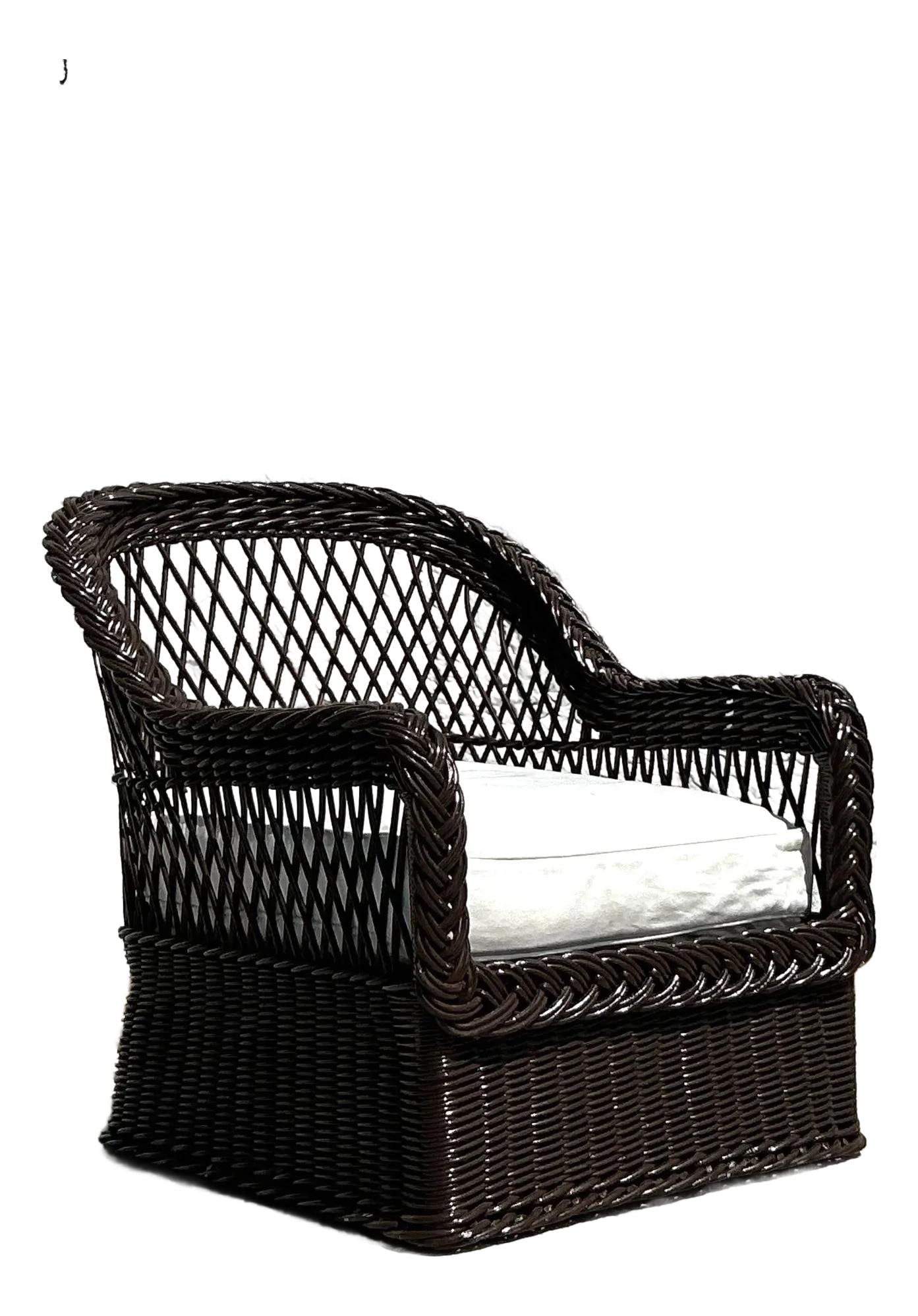 Vintage Bielecky Brothers Coastal Rattan Lounge Chair Espresso Finish: Vintage Bielecky Brothers Coastal Rattan Lounge Chair Espresso Finish This vintage coastal lounge chair, crafted by the renowned Bielecky Brothers, features exquisite woven detailing and exceptional c