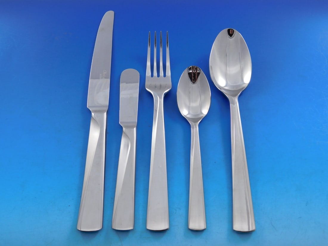 30 Piece Urban Stainless Flatware Set with Wooden Caddy by Christofle France: 30 Piece Urban Stainless Flatware Set with Wooden Caddy by Christofle France This Urban by Christofle flatware set from France features a timeless Mid-Century Modern design crafted in stainless steel.