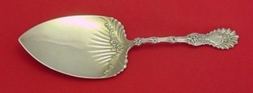 Whiting Radiant Sterling Silver Pie Server 9 1/8" Monogrammed: Whiting Radiant Sterling Silver Pie Server 9 1/8" Monogrammed This exquisite pie server is part of the Radiant pattern by Whiting, crafted from all sterling silver. Measuring 9 1/8" in length, it feat