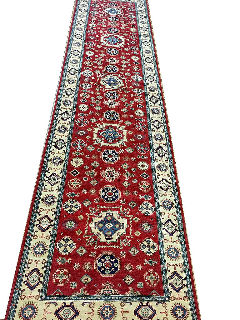 Luxurious 4.6 x 19.2 Red Yakash Kazak Handwoven Rug: Luxurious 4.6 x 19.2 Red Yakash Kazak Handwoven Rug Free continental US Shipping Enhance your space with the luxurious 4.6 x 19.2 Red Yakash Kazak Rug, a stunning addition that effortlessly combines s