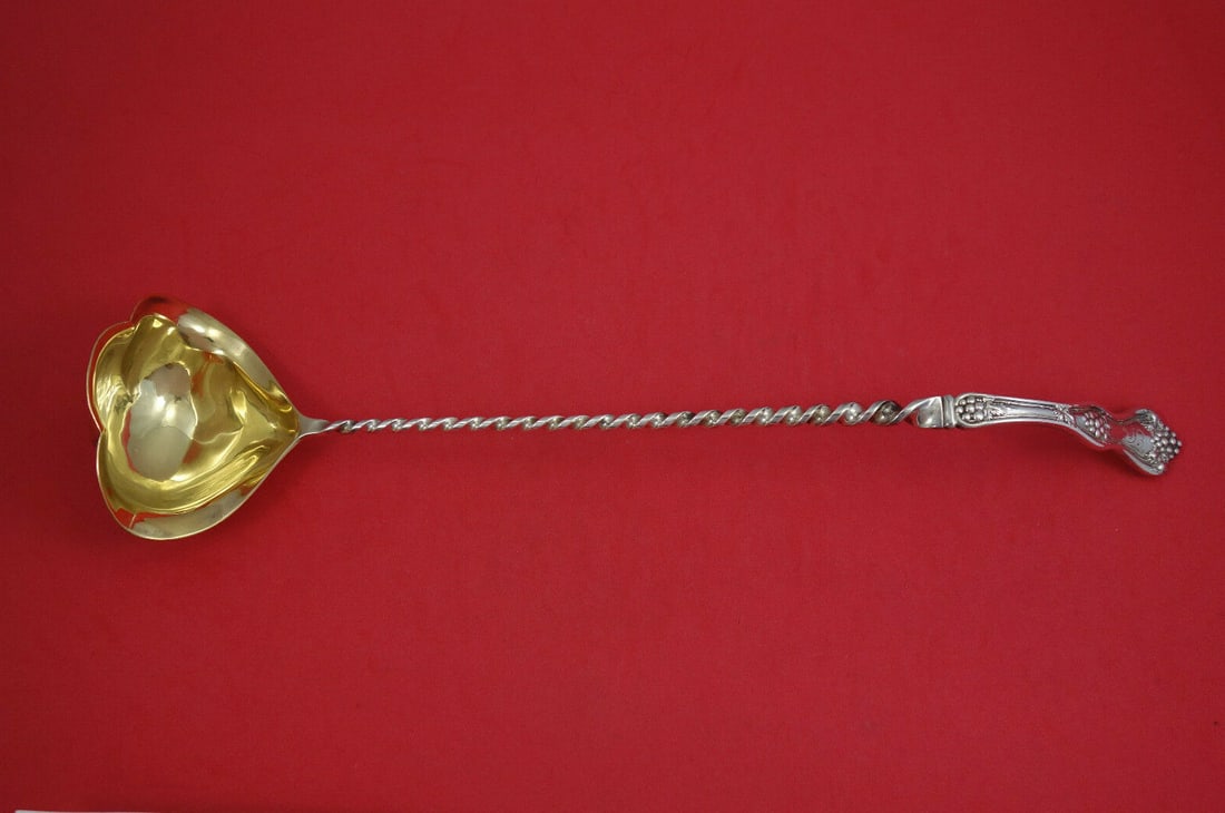 Dominick & Haff Grape Pattern Sterling Silver Bouillon Ladle 13 Inch: Dominick & Haff Grape Pattern Sterling Silver Bouillon Ladle 13 Inch This exquisite bouillon ladle is crafted from sterling silver and features the elegant Grape pattern by Dominick & Haff, dating bac