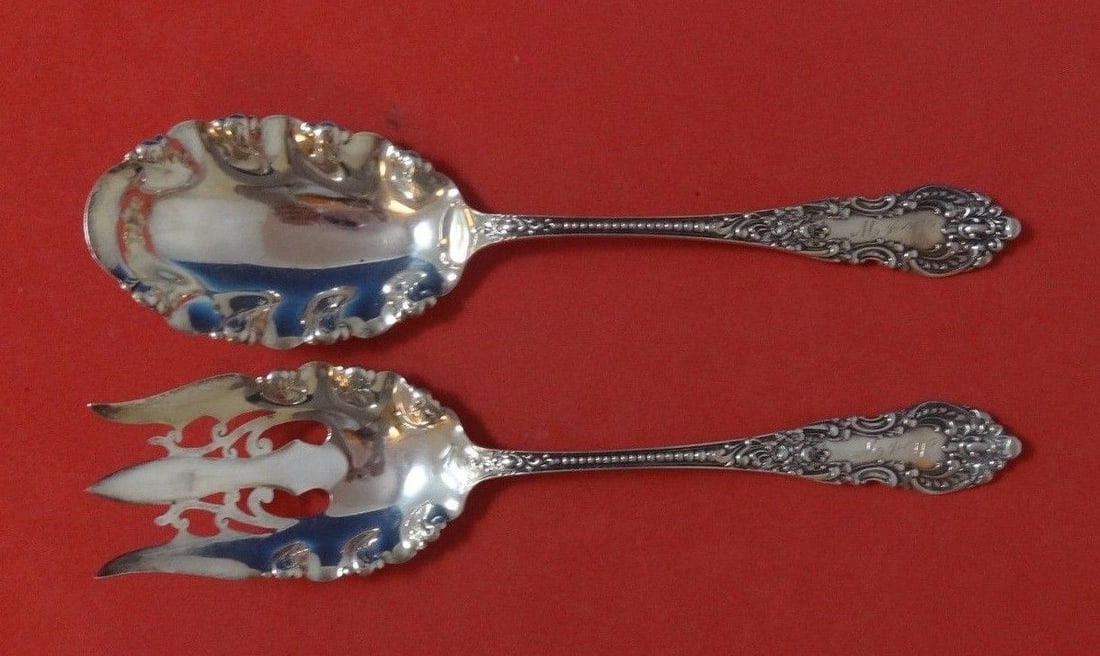 Knowles Mauser Apollo Sterling Silver Salad Server Set 2pc 9" Ruffled: Knowles Mauser Apollo Sterling Silver Salad Server Set 2pc 9" Ruffled Enhance your dining experience with this exquisite Apollo by Knowles and Mauser Sterling Silver Salad Serving Set. This elegant 2-