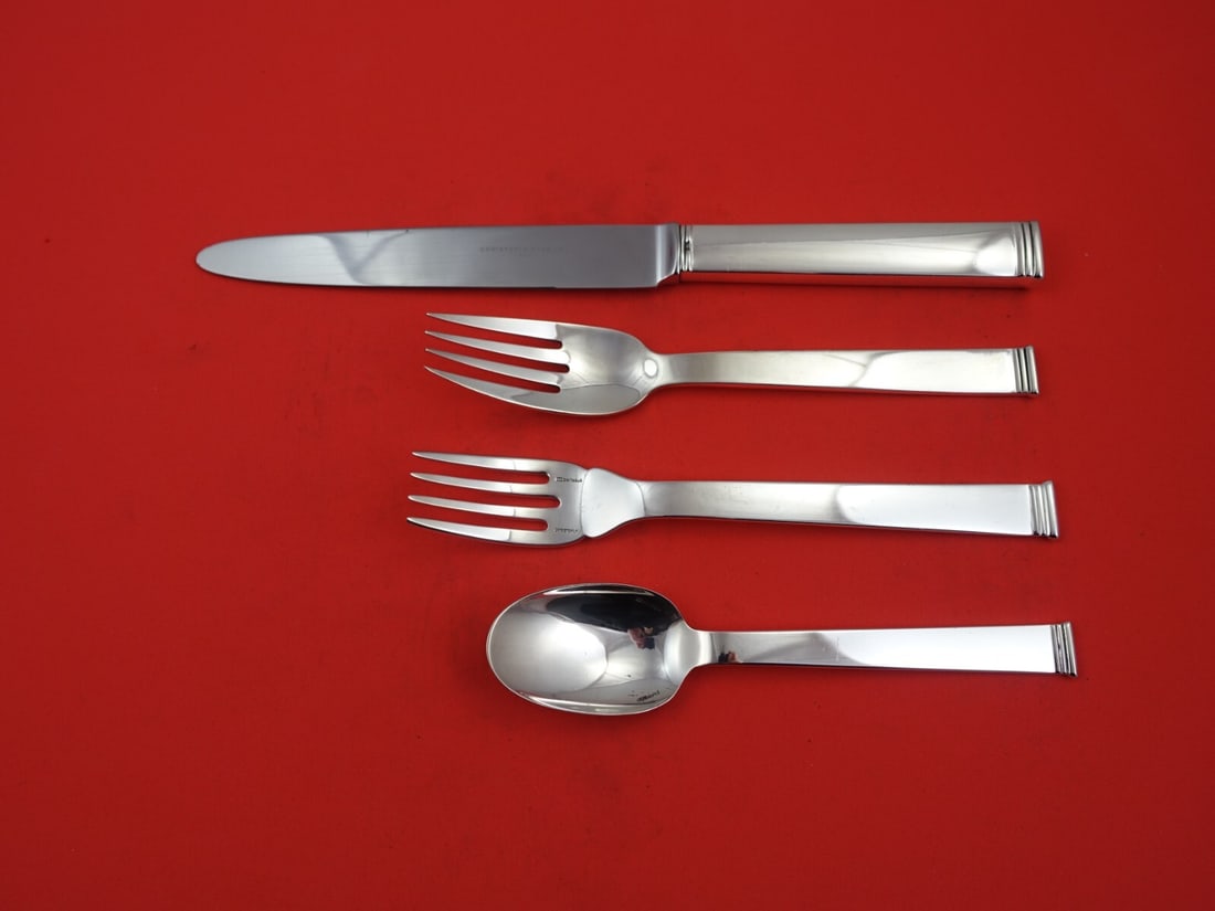 Christofle Commodore Sterling Silver 4-Piece Dinner Place Setting: Christofle Commodore Sterling Silver 4-Piece Dinner Place Setting Elevate your dining experience with this stunning 4-piece dinner size place setting from the Commodore pattern by Christofle. Crafted