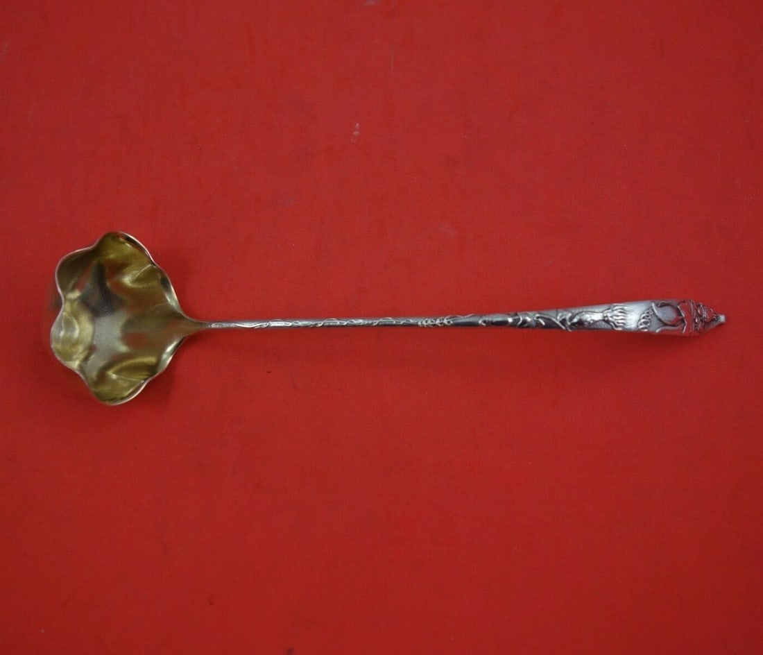 Tiffany Co Vine Sterling Silver Gold Washed Sauce Ladle 7 1/4 Inch: Tiffany Co Vine Sterling Silver Gold Washed Sauce Ladle 7 1/4 Inch This sterling silver sauce ladle features the Vine pattern by Tiffany & Co., dating from 1850-1899. It is gold washed with a fluted