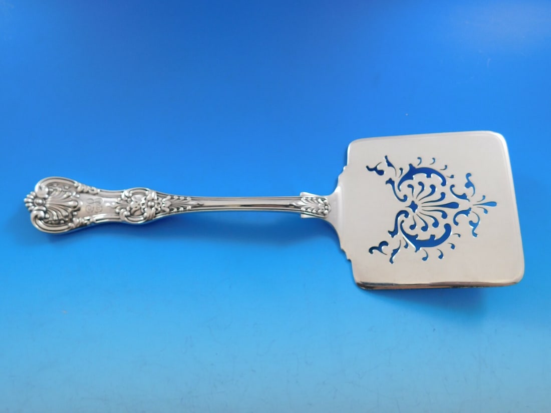 Tiffany & Co English King Sterling Silver Floral Waffle Server 9": Tiffany & Co English King Sterling Silver Floral Waffle Server 9" This exquisite waffle server from Tiffany & Co. showcases the timeless English King pattern, renowned for its elegant pierced floral d