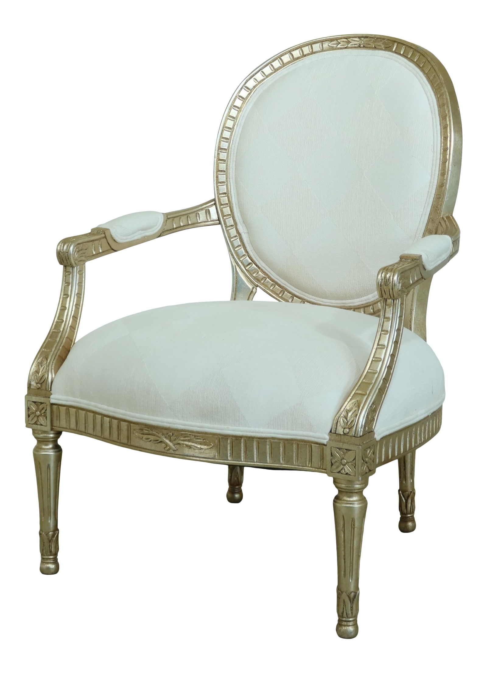 Luxurious Gold Silver Leaf French Style Oversized Armchair: Luxurious Gold Silver Leaf French Style Oversized Armchair This oversized French style armchair is a stunning addition to any space, featuring a luxurious gold and silver leaf finish. Crafted