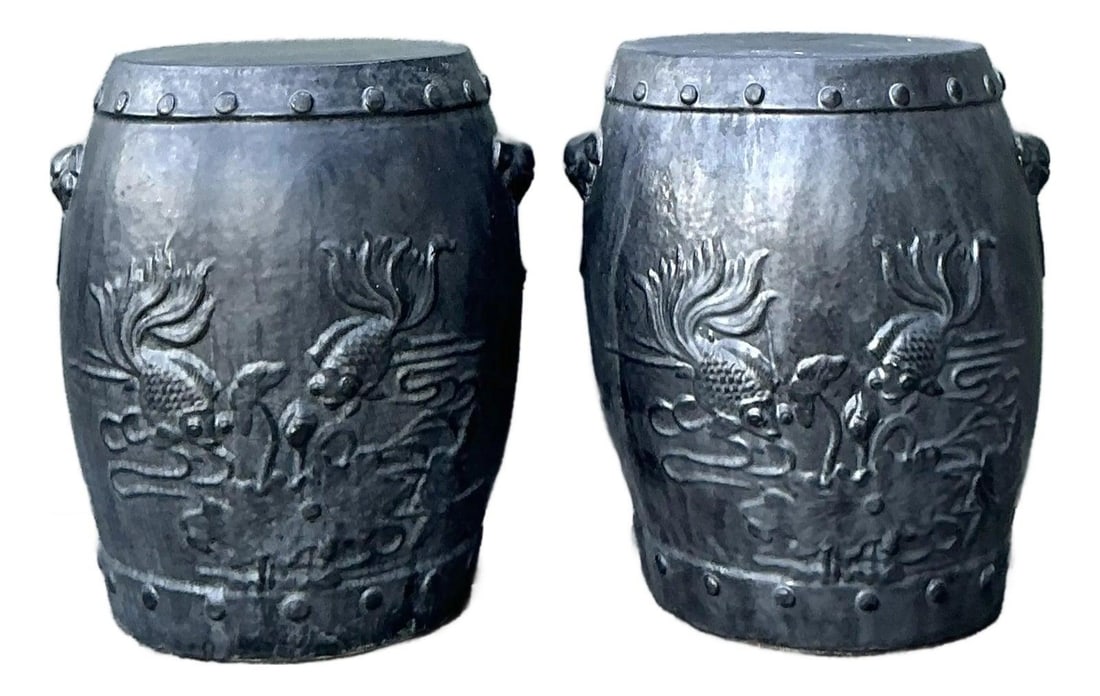 Pair of Matte Black Ceramic Garden Stools with Koi Fish Relief: Pair of Matte Black Ceramic Garden Stools with Koi Fish Relief This pair of vintage ceramic garden stools features a rare matte charcoal-black finish, offering a sophisticated, industrial-inspired loo